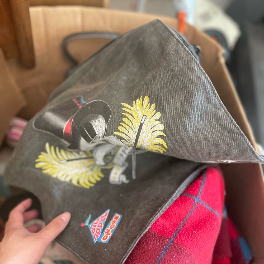 Gray Tote Bag with Hat and Feather Design